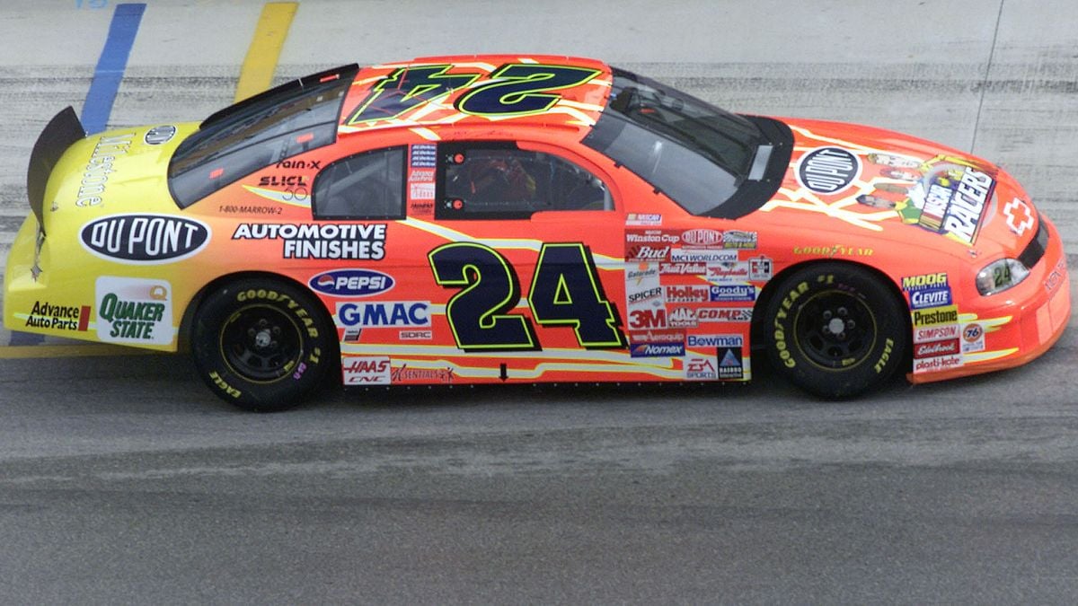 Top NASCAR Winston Cup series driver Jeff Gordon drives one of the 'NASCAR RACERS'-themed cars, unveiled Thursday, November 11th at the start of the Pennzoil 400 weekend at Homestead-Miami Speedway.